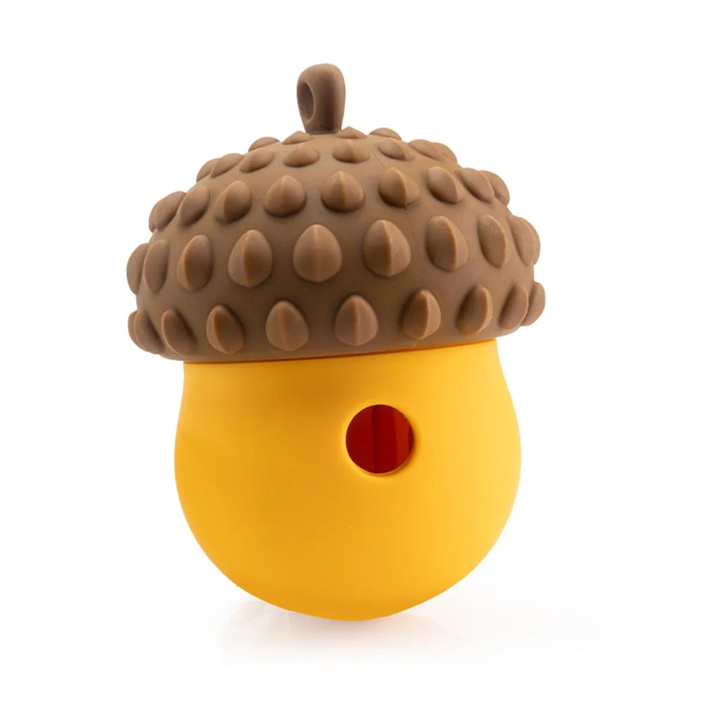 A yellow slow feeder puzzle toy for dogs and cats with a brown, textured dome top.