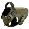 A tactical dog harness in olive drab fabric with a MOLLE system and leash attachments.