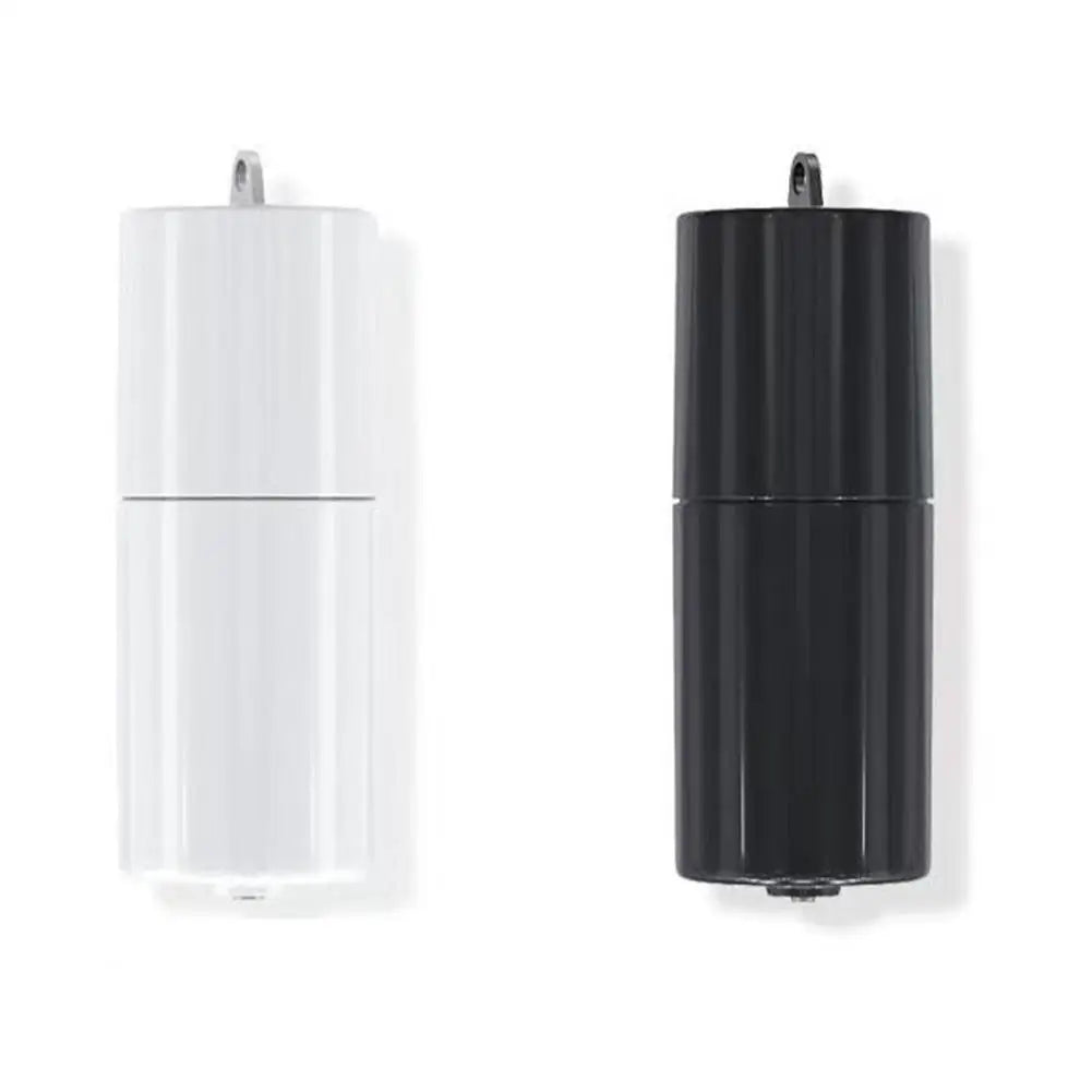 Pompe à air mini aquarium USB noire avec une pierre d'air.