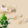 A wooden cat climbing hammock is mounted on a wall, featuring striped fabric and cat face designs.