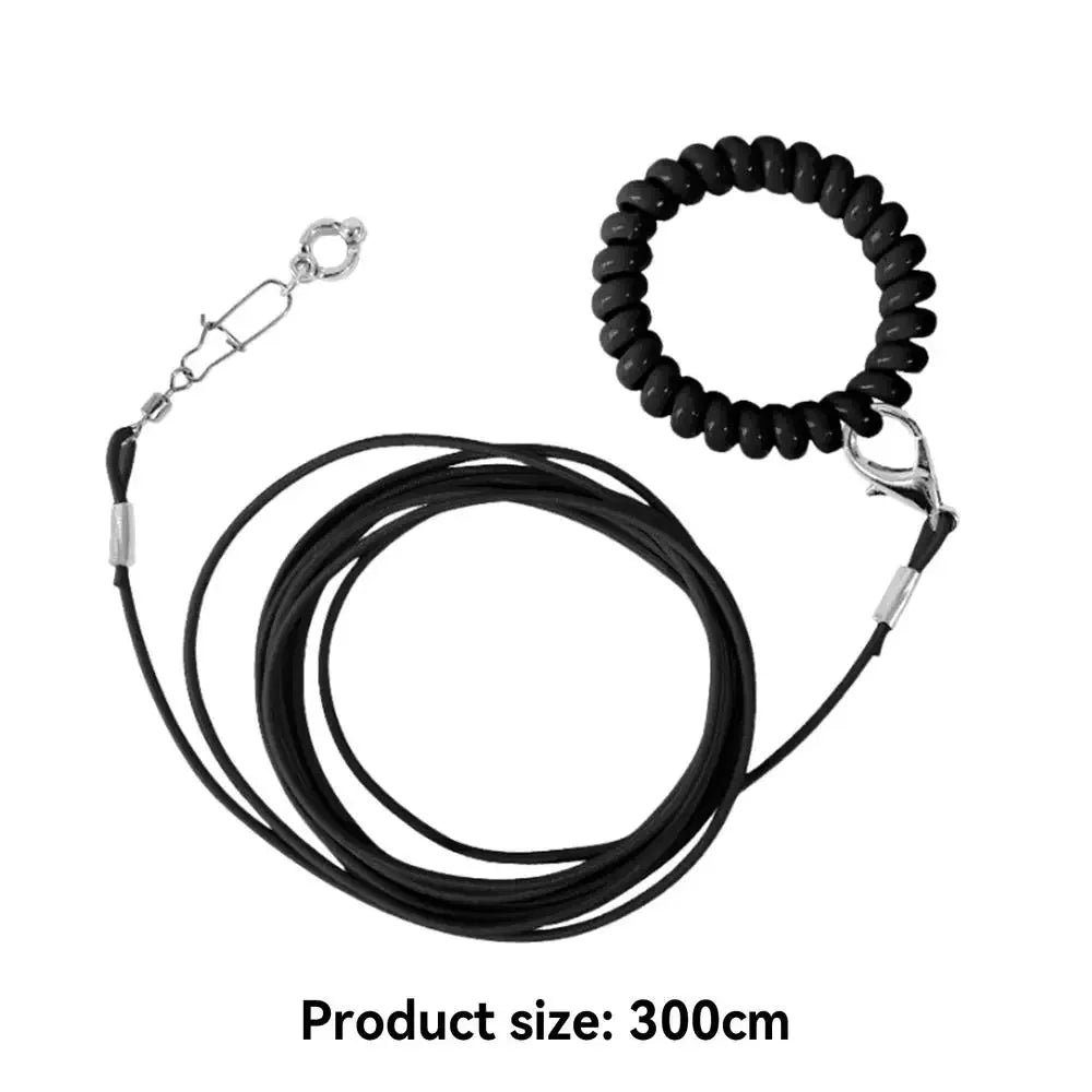 Black parrot flight training leash with a foot ring and a coiled cord
