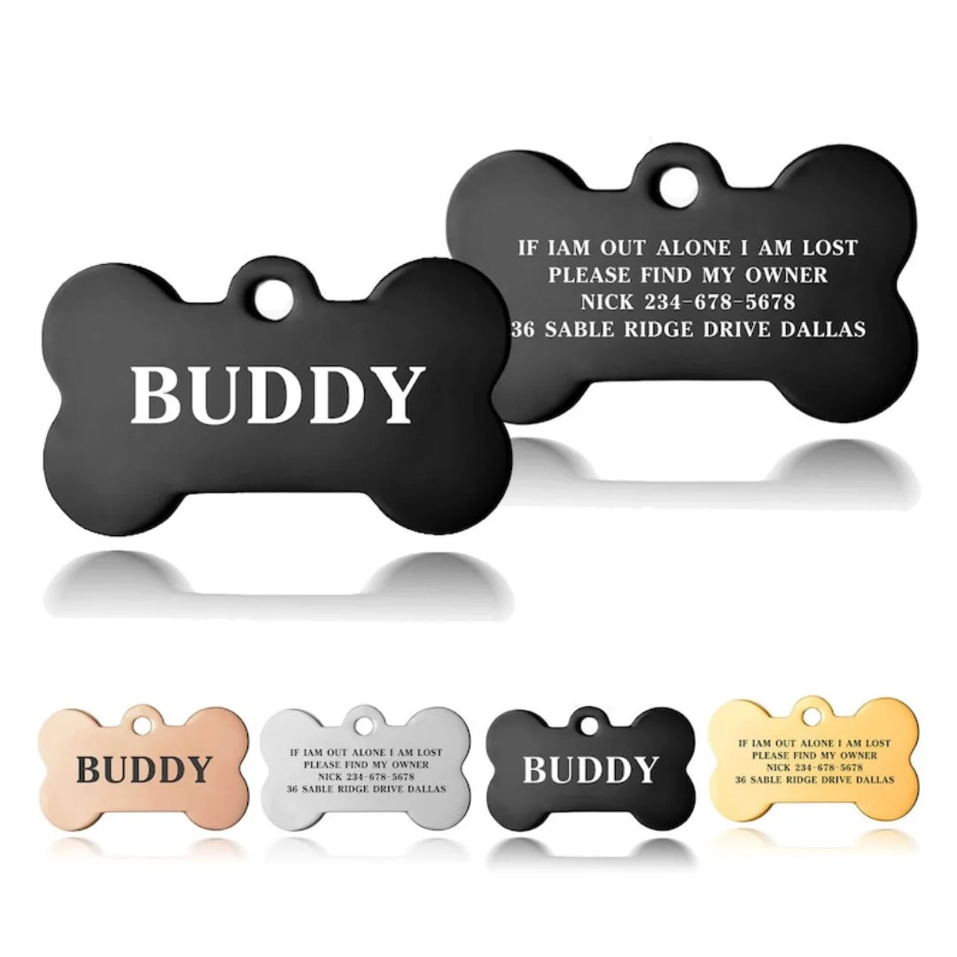 Black engraved bone-shaped pet ID tag with the word BUDDY on it