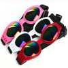 A set of durable pet sunglasses in pink and red frames with UV protection, shown against a white background.