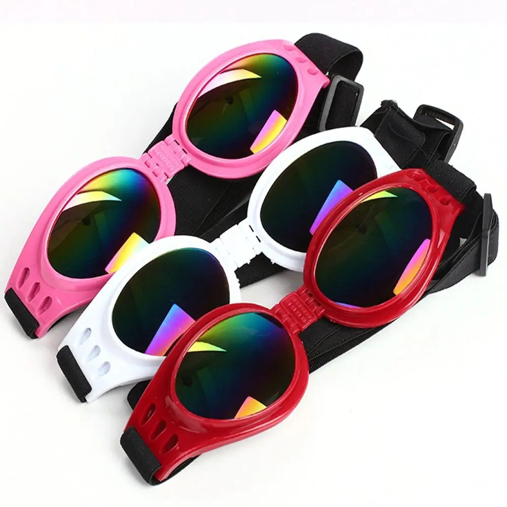 A set of durable pet sunglasses in pink and red frames with UV protection, shown against a white background.