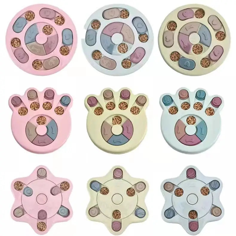 A collection of pink and light-colored interactive dog slow feeder puzzle toys with various patterns and shapes.