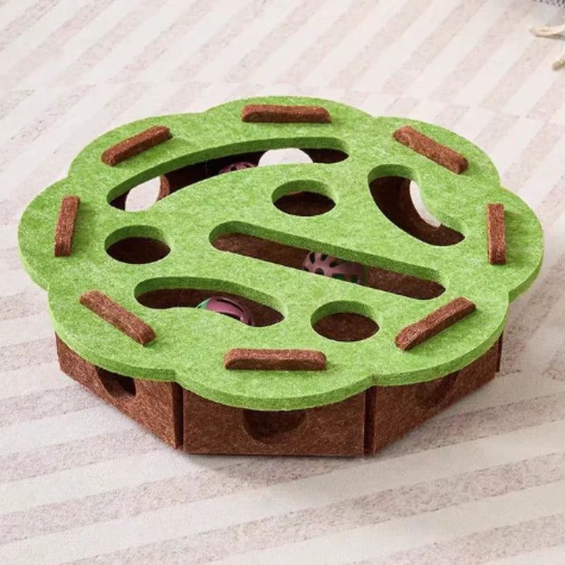 A green felt maze puzzle toy for cats with a bell ball, featuring various tunnels and obstacles.