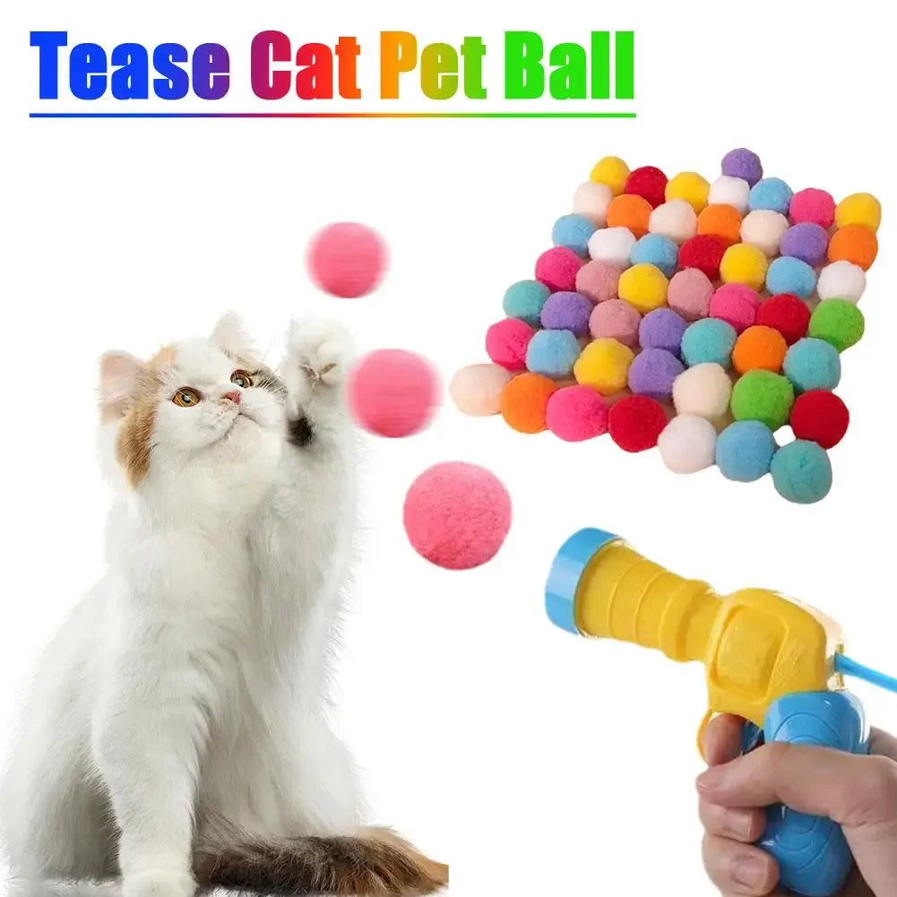 A fluffy white cat is looking at a colorful grid of soft plush balls, which are the components of a tease cat pet ball toy.