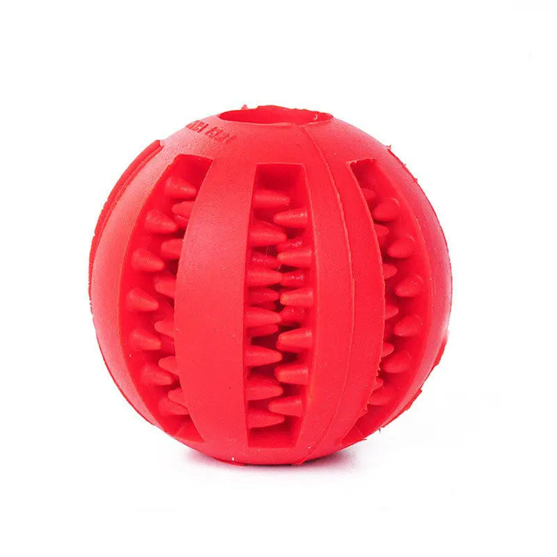 Leuchtend rote Gummi-Kauspielball mit Rillen, für Hunde.