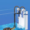 A wall-mounted aquarium filter is shown operating at low water levels with a turtle swimming in the tank.