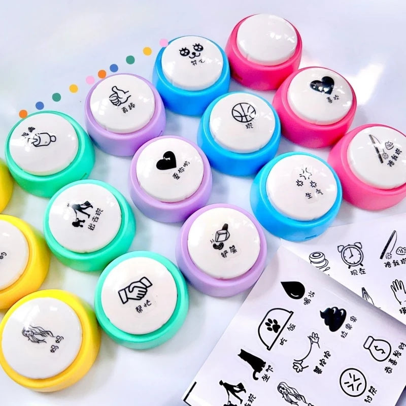 A collection of colorful linen pet talk buttons for dogs and cats, featuring various icons like hearts, paws, and hands.