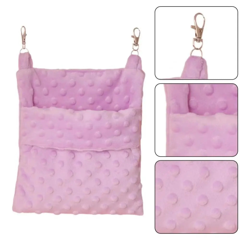 A pink, quilted hanging sleeping bag for small pets shown with close-up details.