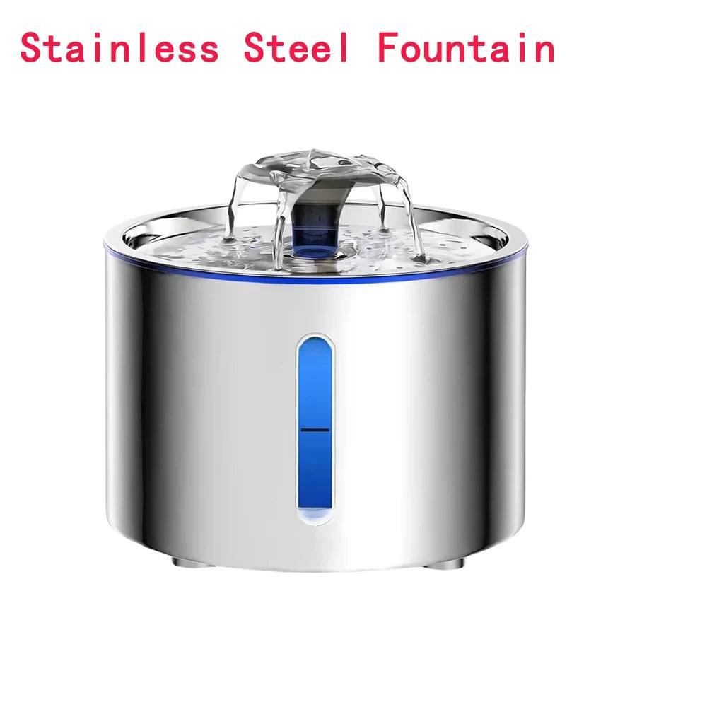 A stainless steel fountain is shown with water flowing from the top, featuring a blue control switch.