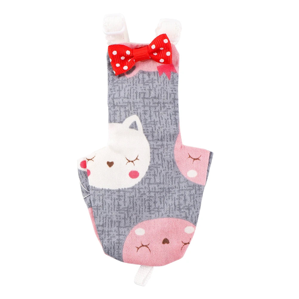A reusable parrot diaper in gray fabric with a pink design and a red bow.
