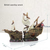 A model of a British warship wreck with a cave hideout for fish tanks.