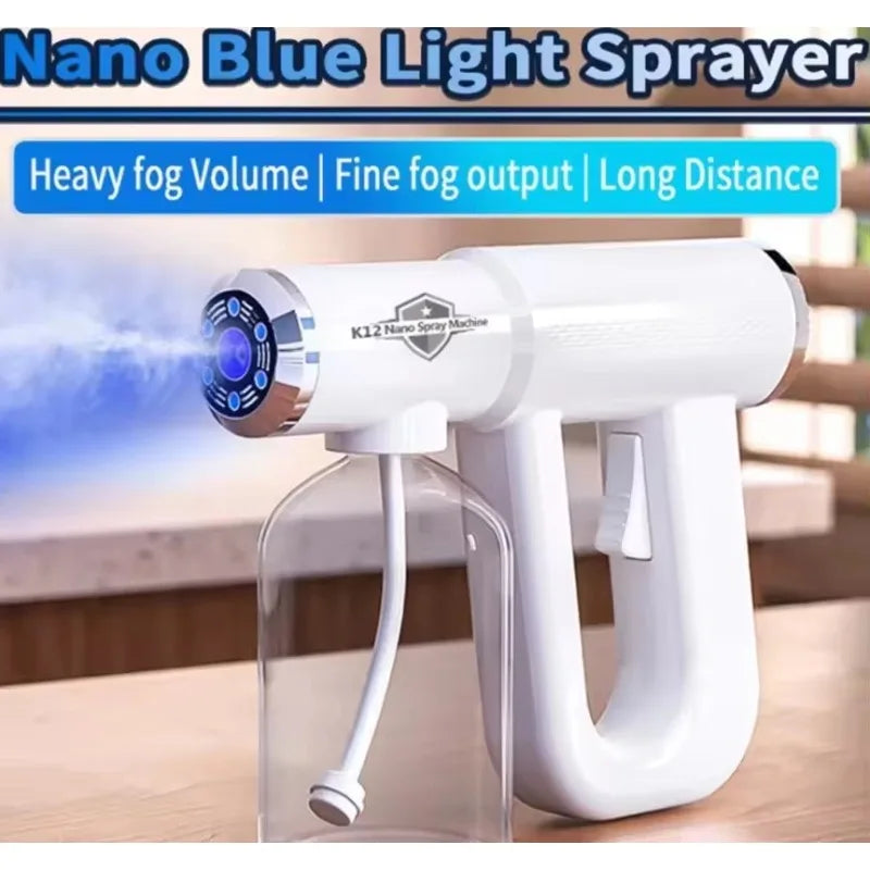 A white Nano Blue Light Sprayer device is shown next to a clear container, demonstrating its fog output.