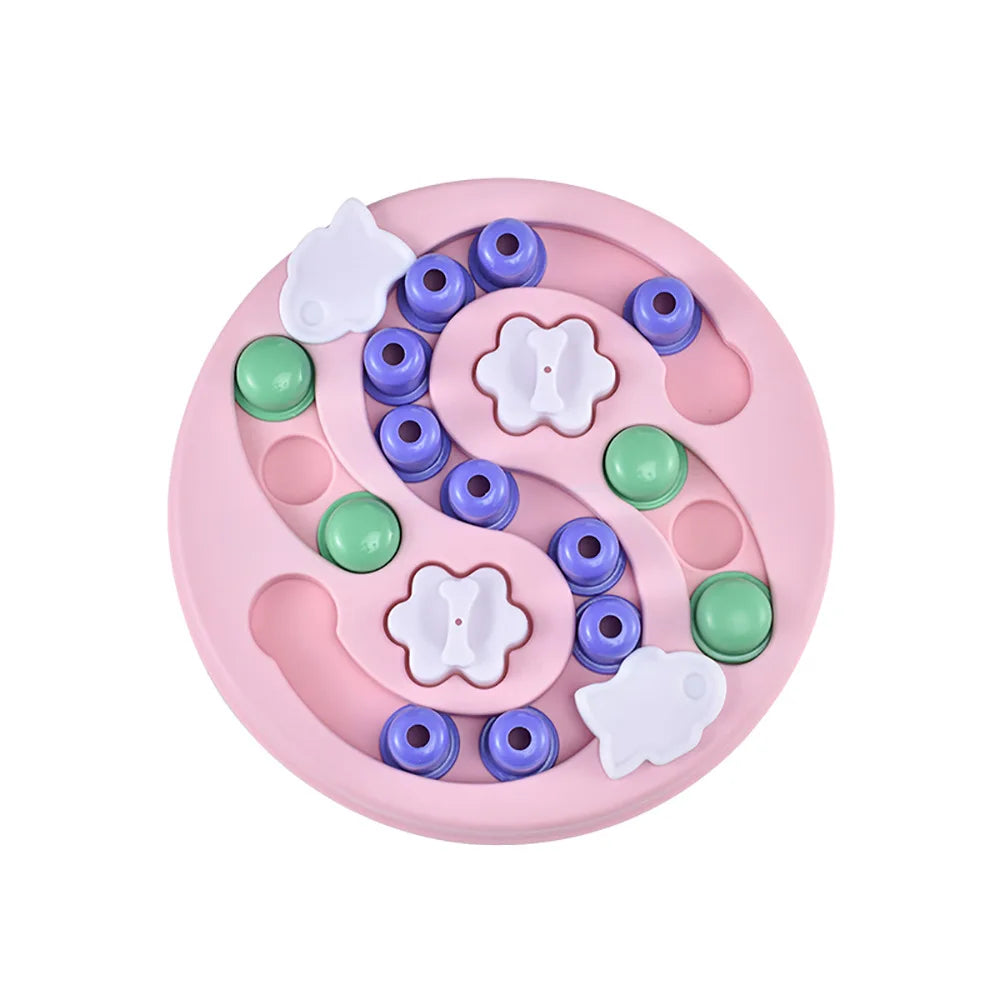 A pink interactive puzzle slow feeder bowl with various colored silicone puzzle pieces for pets.
