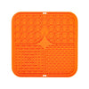 Orange silicone pet licking mat with suction cups for calm and slow feeding