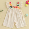 A light pink toddler romper featuring floral embroidery trim on the neckline and cuffs.