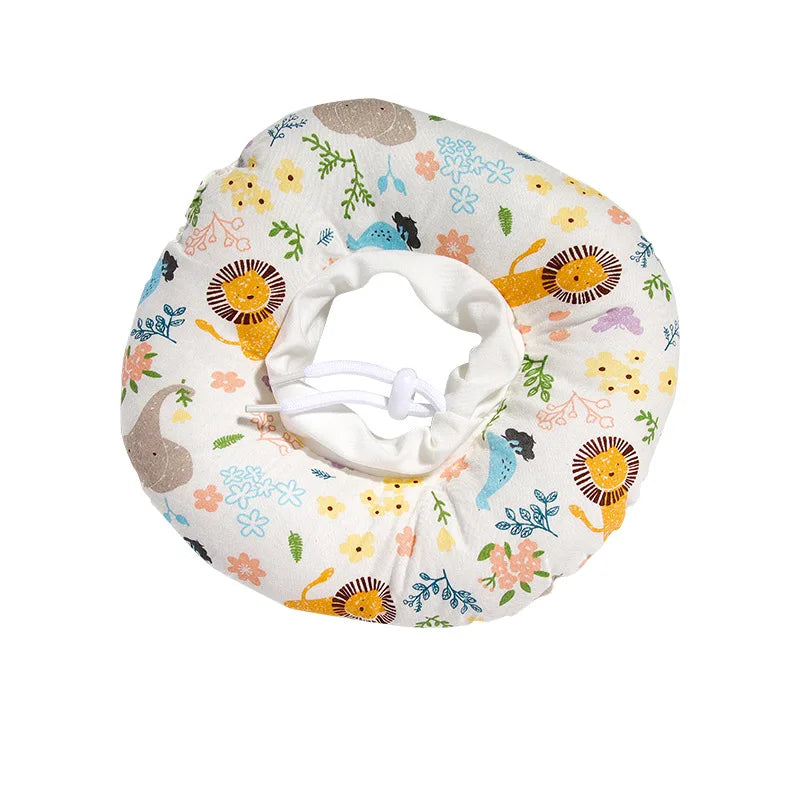 A soft cotton recovery collar for dogs and cats featuring a floral pattern with various colorful elements.