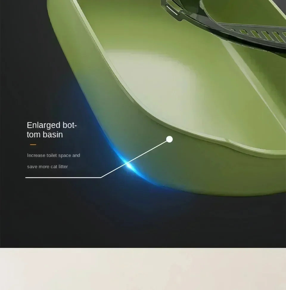 A close-up view of a light green semi-enclosed splashproof cat litter box highlighting the enlarged bottom basin for more spa