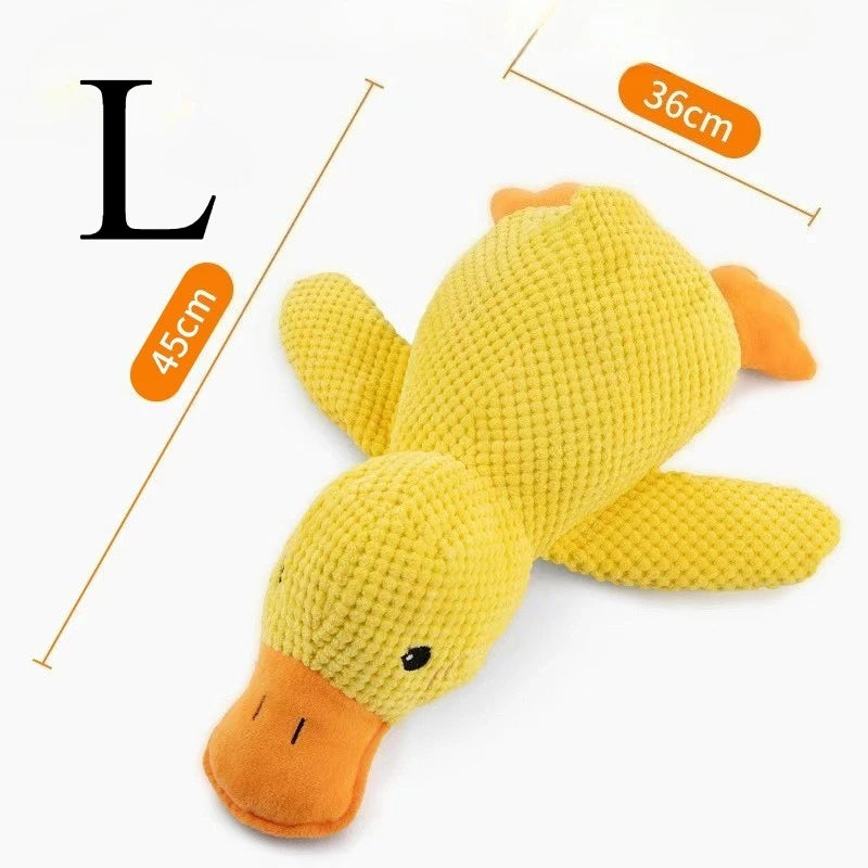 A yellow plush duck dog chew toy with orange accents, shown against a white background.