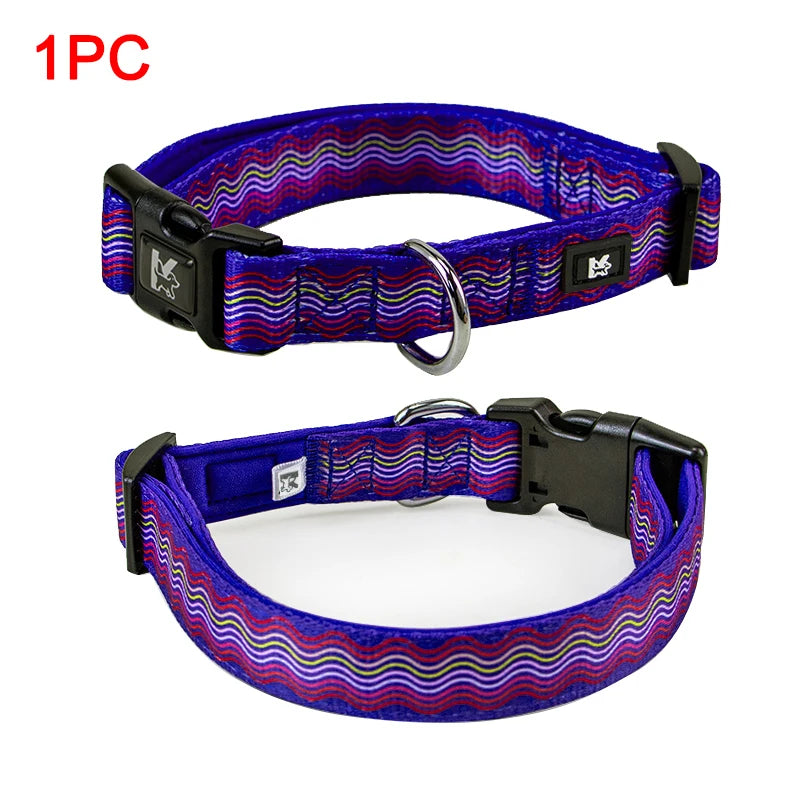 A purple and pink plaid polyester dog collar with a black buckle and silver ring.