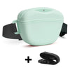 Light mint green silicone dog treat pouch with a black belt clip and accompanying accessory.