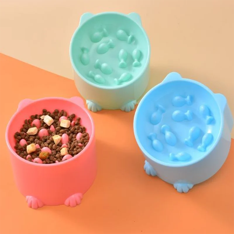 Three silicone slow feeder bowls for pets in pink, mint green, and blue colors