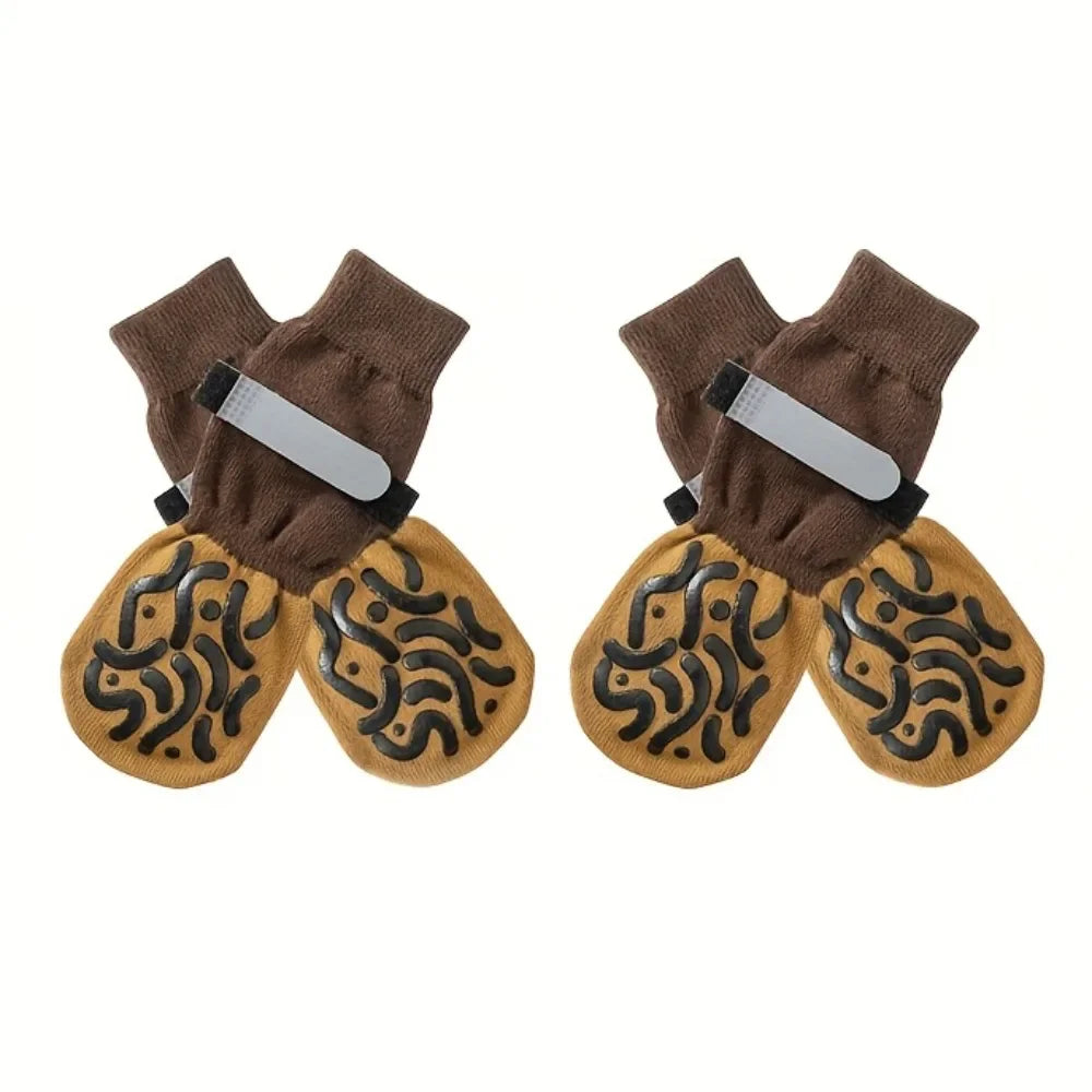 A pack of four anti-slip pet paw protection socks in brown and tan colors.