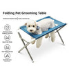 Folding pet grooming table with a blue mesh hammock for bathing and nail trimming