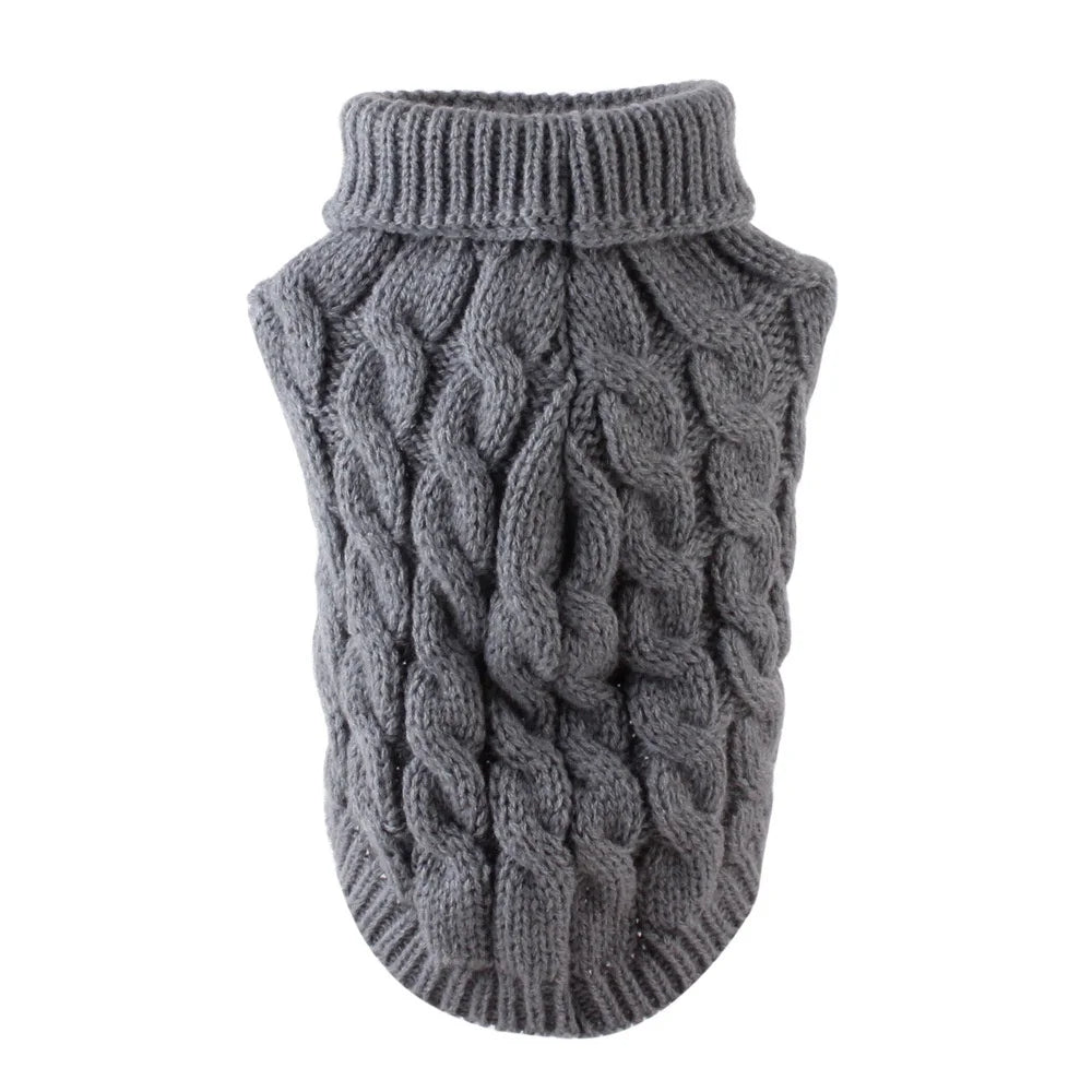 Pull gris en tricot pour chien avec poignet côtelé et corps texturé.