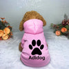 Pink Adidog hoodie sweatshirt with a brown dog head attached, displayed on a white surface.