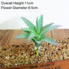 A flock artificial succulent plant with a 9.5cm flower diameter is displayed on a wooden surface.