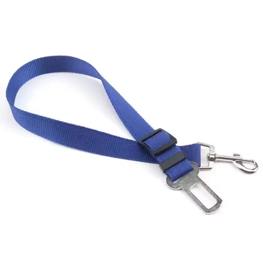 A blue adjustable pet car safety harness with a seat belt clip and strap.