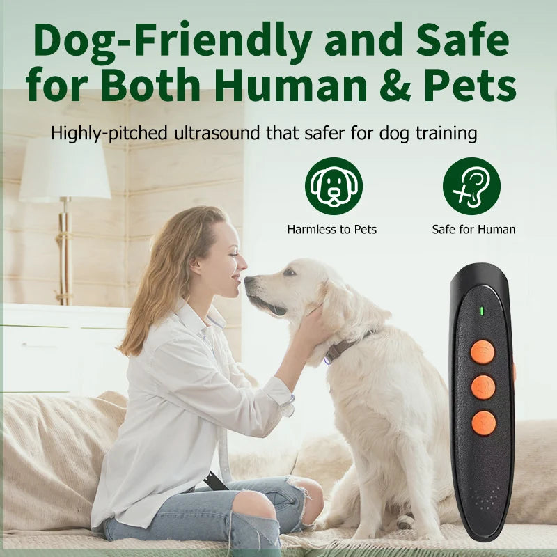A woman is training a dog using an ultrasonic bark deterrent device.