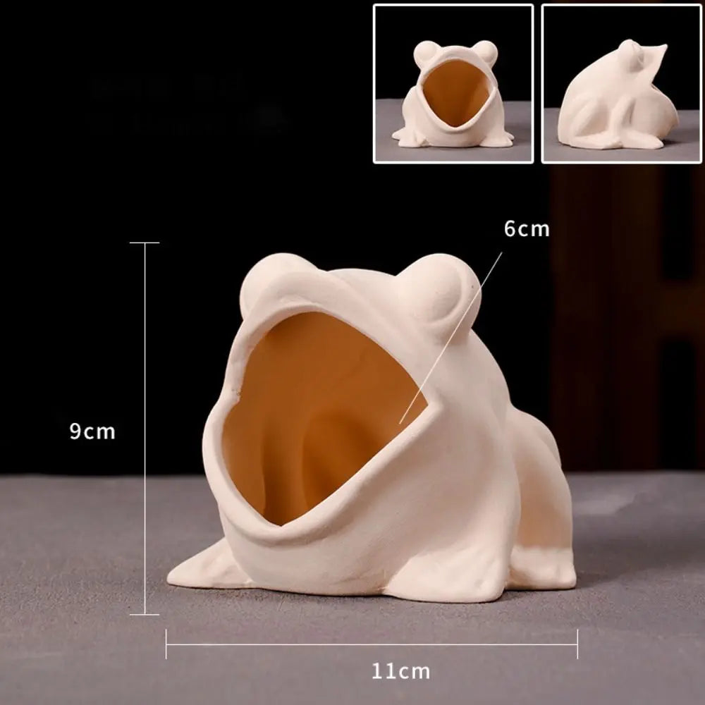 A white ceramic aquarium shrimp hideaway cave with an arched entrance and textured exterior.