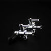 A silver 5-way aquarium air flow splitter valve with multiple outlets.