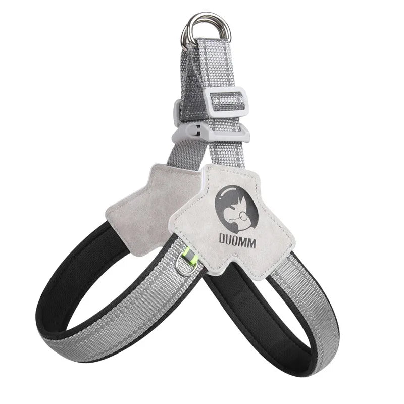 A gray reflective mesh pet harness for dog and cat walking with a silver metal clip.