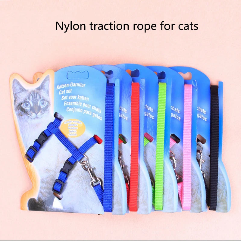 A set of nylon traction ropes for cats, including an adjustable chest strap and leash.