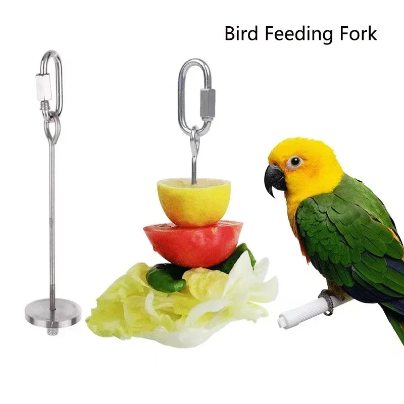 A stainless steel bird feeding fork with a hook and a bowl, next to a yellow parrot.