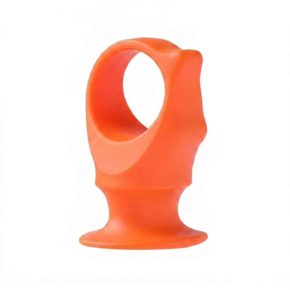 Orange silicone pet toothbrush for dogs with a loop handle
