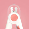 A close-up view of a white LED pet nail clipper for cats and dogs against a pink background.