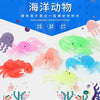 A collection of colorful soft rubber fish bath toys for children, including pink, orange, green, and blue varieties.