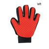 A bright red silicone pet grooming glove with a black cuff and textured palm for gentle de-shedding.