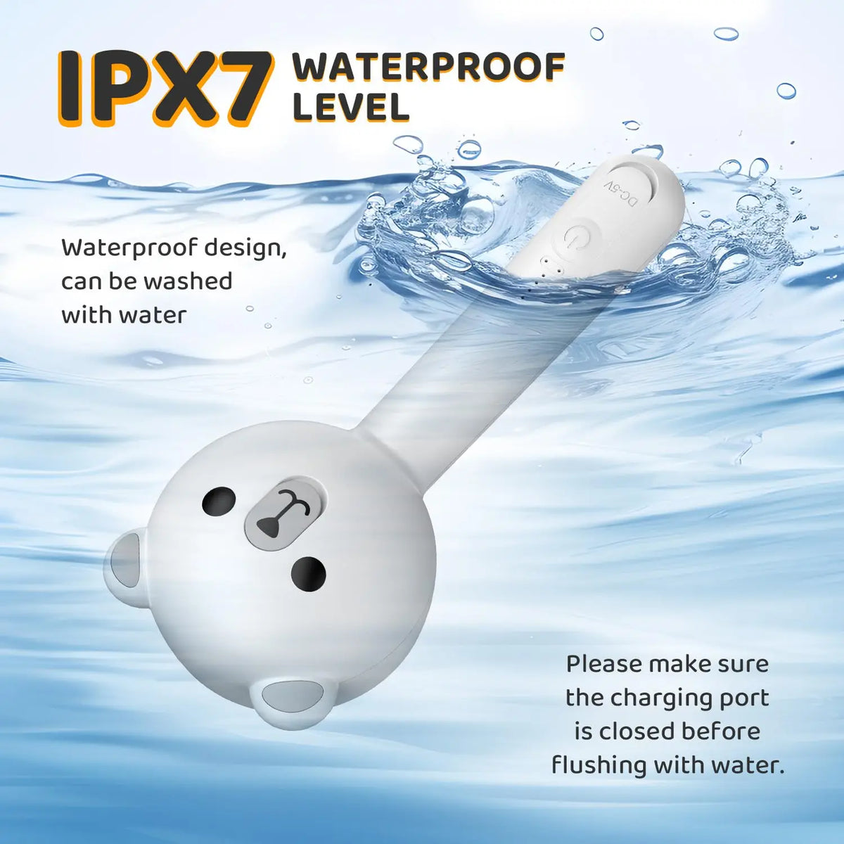 A white pet grooming brush is shown submerged in water, demonstrating its IPX7 waterproof level.