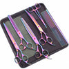 A black case holding a set of professional stainless steel pet grooming scissors and a comb.