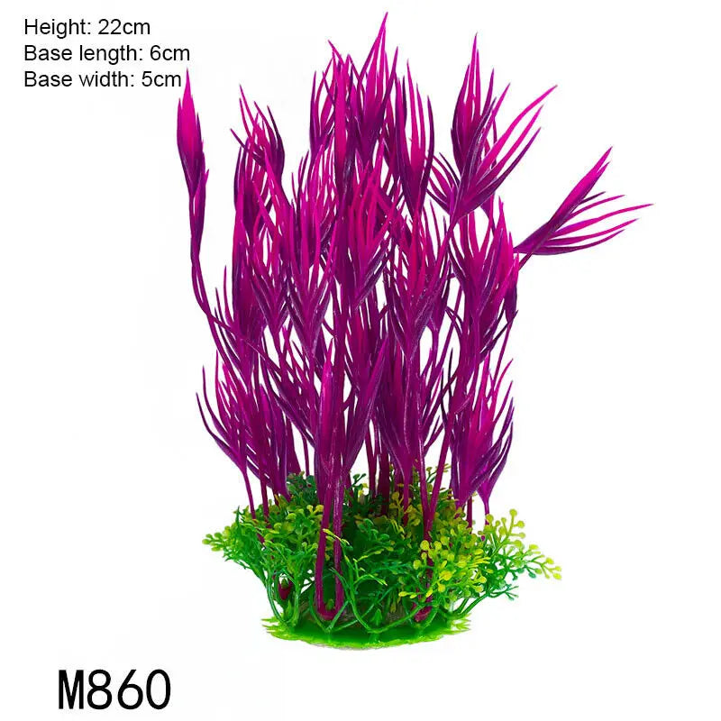 A vibrant magenta artificial aquarium plant with tall, thin leaves growing from a green base.