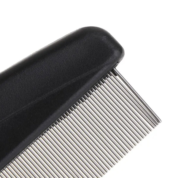 A close-up view of a black handle and stainless steel pet grooming comb for dogs and cats.
