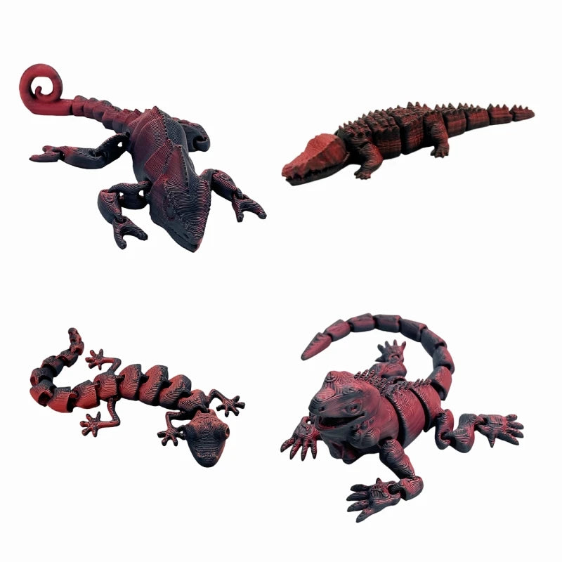 A set of three 3D printed reptile figurines including a lizard, chameleon, gecko, and crocodile.