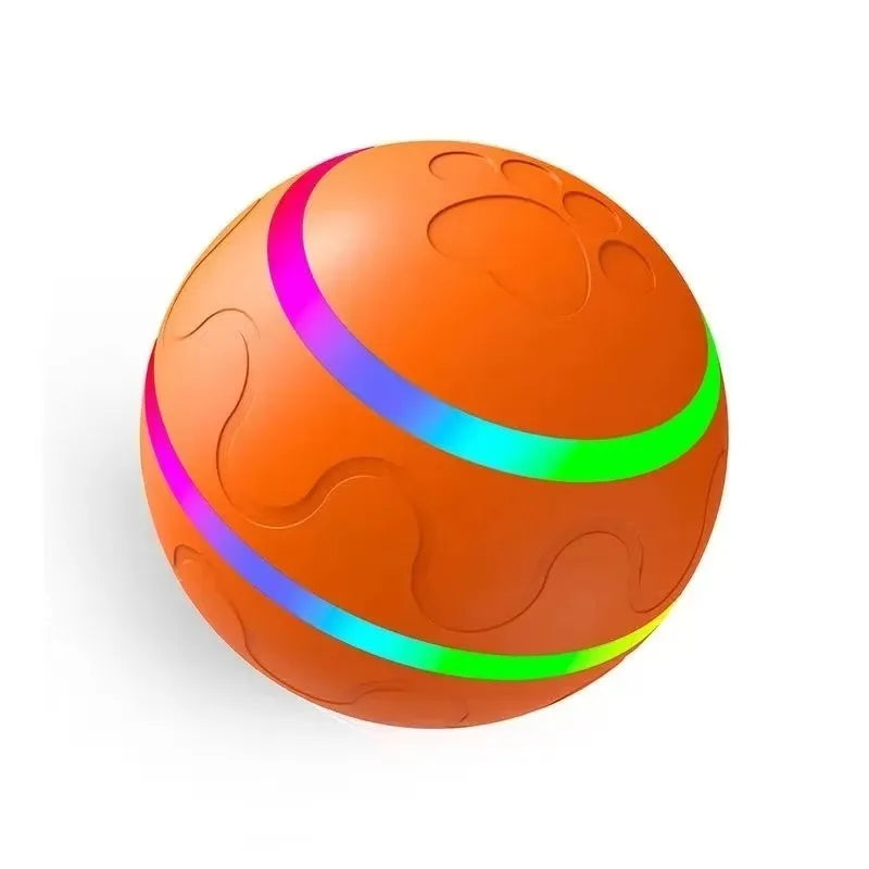 An orange spherical pet ball with glowing purple and green LED light rings.